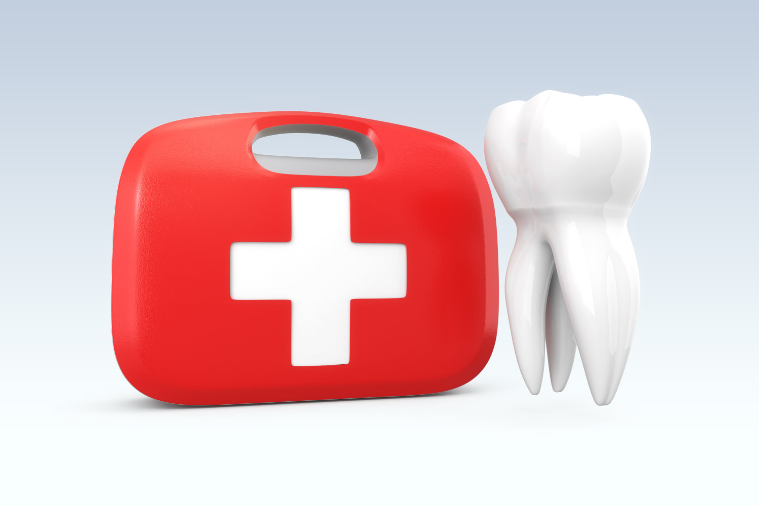 A red first aid kit next to a white tooth to indicate a dental emergency in Denver, CO