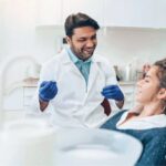 young woman gets preventative dental care at the dentist office