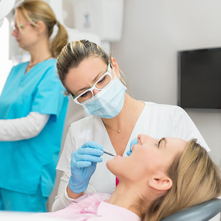 dentist examining a patient's teeth